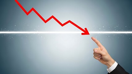 Businessman's pointing finger indicates a critical financial drop represented by a sharp downward trend on a striking red graph line