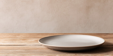 Empty Ceramic Plate on Wooden Table with Minimal Background and Copy Space