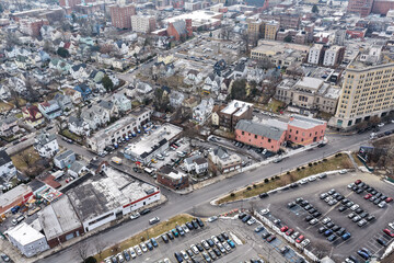 Fototapeta premium Foggy aerial drone photo of Mount Vernon New York with overcast winter sky and dense neighborhoods, image 28