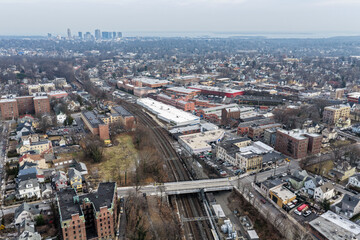 Obraz premium Foggy aerial drone photo of Mount Vernon New York with overcast winter sky and dense neighborhoods, image 30