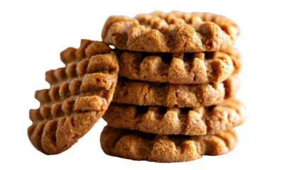 Stack of textured brown cookies, one leaning, against a stark black background