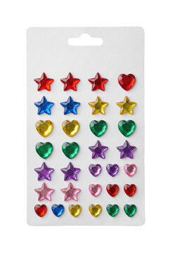 Sheet of stick-on jewel earrings isolated. Kids adhesive gem accessories.