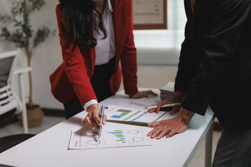 Business team analyzing financial data charts collaborating strategy