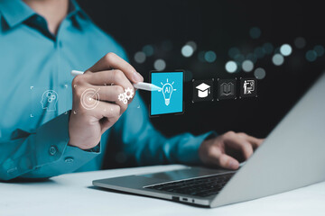 Artificial intelligence and digital education concept with business person using laptop and virtual interface, showing AI learning, smart education, online training, innovation, and future technology.