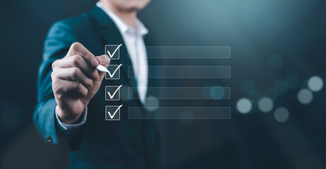 Businessman hand checking virtual checklist with digital interface. Concept of business document planning, task management, quality control, audit process, productivity, workflow, corporate strategy.