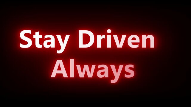 Inspirational stay driven always message with glowing red neon effect on black background for motivation