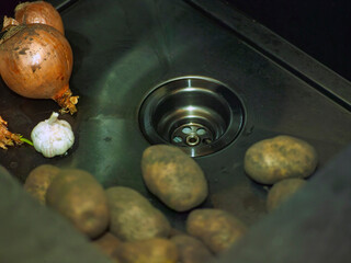 whole potatoes, onion and garlic