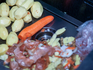 peeling potato, carrot and onion