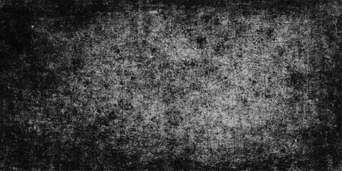 Obraz premium Aged dark grunge texture with a rough black and white vintage pattern on an old dirty concrete wall surface for a textured grey stone backdrop wallpaper