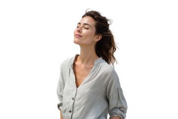 Serene young woman with eyes closed, smiling and feeling the breeze with wind in her hair, isolated on transparent background