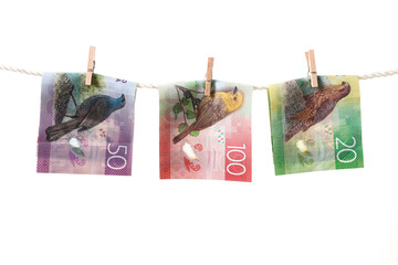 Money Laundering Concept New Zealand Dollars