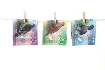 Money Laundering Concept New Zealand Dollars