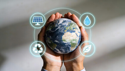 conceptual image of human hands cupped together protecting a floating earth globe with glowing digital icons for solar energy water recycling and green leaf for environmental sustainability