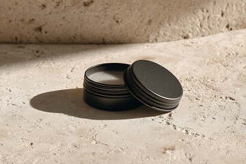 Small metal container on concrete surface