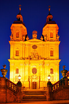 Illuminated Holy Trinity Basilica in Goessweinstein at night