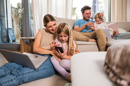 Family spending leisure time at home