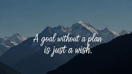 Inspiring quote about goals and planning overlaid on a majestic mountain landscape