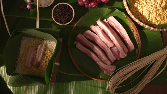 Top view video showing prepared pork and ingredients ready for Chung cake, highlighting the traditional Tet food preparation process, ingredients table