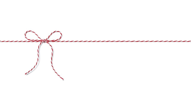 Elegant red and white baker's twine bow with string extending horizontally on white