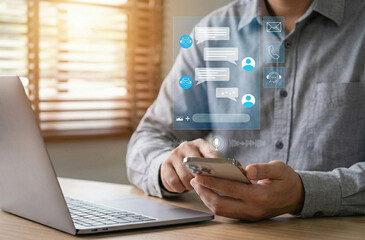 AI chatbot in customer service and support with automation. male user chatting on smartphone with AI assistant and voice input to access customer support tools, messaging, and online communication