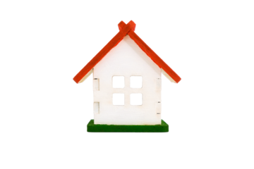 Wooden toy white house with red roof isolated on transparent background