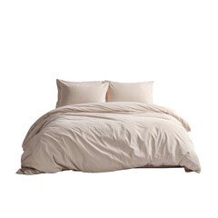 Softly lit beige bed with two pillows and duvet against a dark background