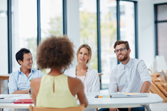 Meeting, job interview and business people in office for hiring, vacancy or recruitment opportunity. Discussion, panel and candidate with human resources team for onboarding process in workplace.