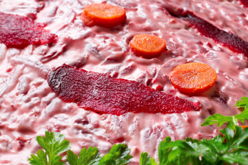 Festive herring salad under a fur coat close-up. Parsley salad