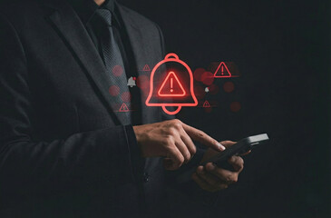 Corporate man handling emergency alert notification on mobile phone, concept of warning message, cyber threat monitoring, digital security breach, urgent system error, and risk management