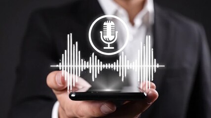 A businessman holds a smartphone displaying a voice recording icon with sound waves representing modern communication and digital audio technology - Powered by Adobe