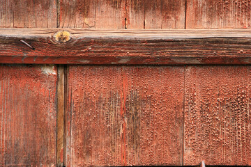 Weathered painted wood boards with textured surface in Switzerland
