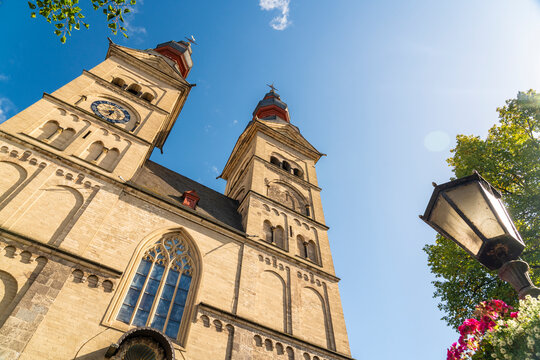 Basilica of St. Castor historic church in Koblenz under blue sky