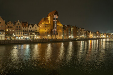 Naklejka premium Gdansk and the Motlawa River at night, Poland.