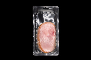 Top view of sliced smoked beef meat in vacuum package isolated on black background. Raw smoked packaged meet isolated