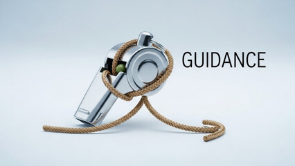A silver whistle with a brown rope wrapped around it on a white background with the word GUIDANCE