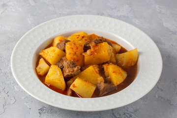 A meat and potato dish from traditional Turkish cuisine. Turkish name; Etli patates yemegi or patates tava