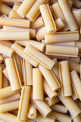 Uncooked Italian "papiri" rolled noodles. Raw Papiri pasta.