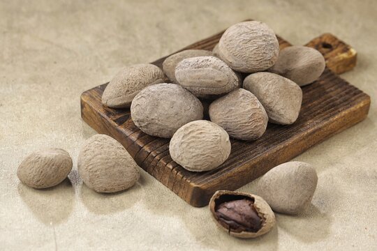 Kluwek also known as keluak, keluwak, or black nut - the seeds of the Pangium edule tree
