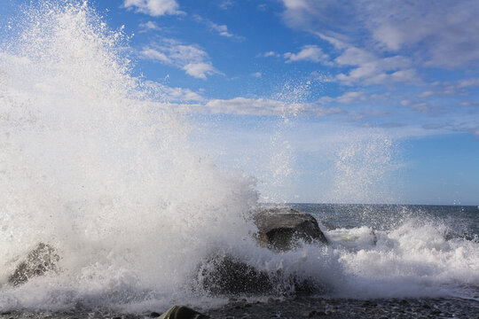 Surf splashing against rocks at Gillespies Beach Tasman Sea New Zealand