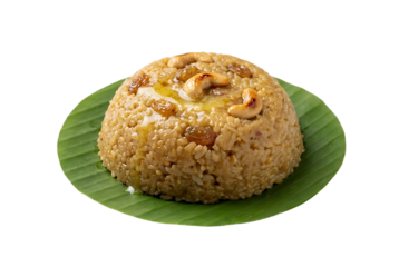 Delicious sweet pongal rice dish garnished with cashew nuts and raisins on banana leaf for lohri and pongal and makar sankranti isolated on transparent background