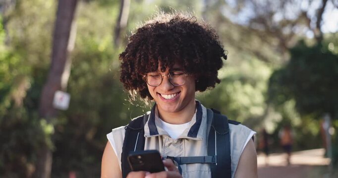 Cellphone, backpacking and man in nature for hiking on vacation, getaway or weekend trip with texting. Happy, phone and male person with trekking blog on mobile app for outdoor exploring tips.
