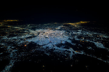 Aerial view of Baghdad city at night with Tigris river meanders, Iraq