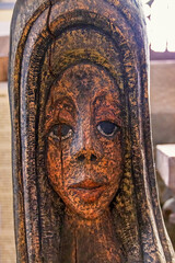 Close-up of a head sculpted in wood