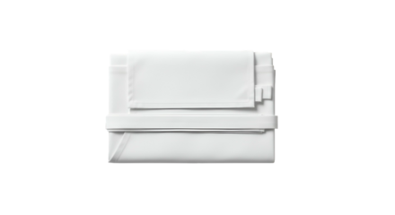 Folded white bedding set on black background, crisp and neat