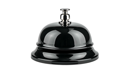 Glossy black desk bell with silver top, isolated against black