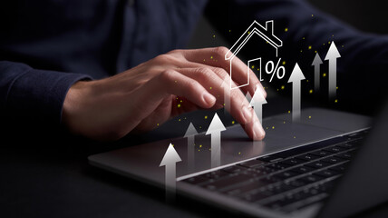 Real estate investment concept: man touching virtual house icon to analyze mortgage loan, insurance, interest rates, and investment planning for business real estate
