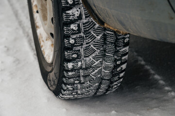 winter tires on cars in the snow © Павел Чигирь