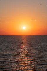 Obraz premium Beautiful red and orange sunrise over the sea.