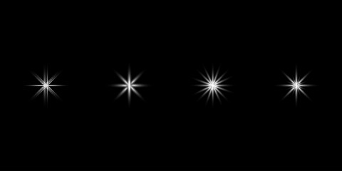A set of three white star-shaped light bursts on a black background.