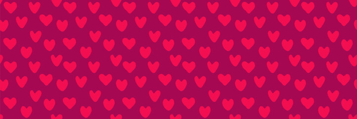 Seamless repeating pattern with hand-drawn red hearts on a pink background. Perfect for Valentine&rsquo;s Day, love themes, wallpapers, textiles, wrapping paper, and romantic designs